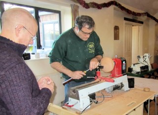 Paul turning another bowl to be decorated